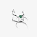 Serti sur Vide ring set with 2 diamonds and 1 emerald