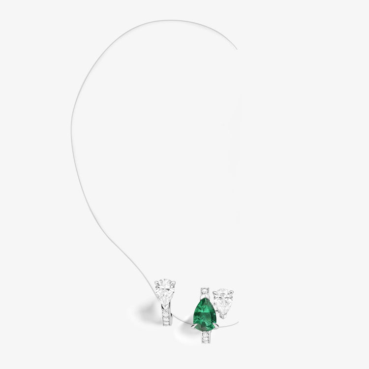 Serti sur Vide earring set with 2 diamonds and 1 emerald