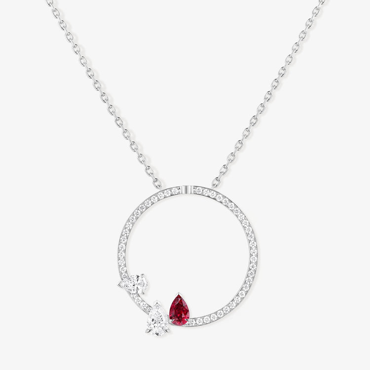 Serti sur Vide pendant set with 2 diamonds and 1 ruby